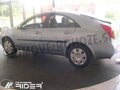Nissan Primera 2002-2008 - ochranné lišty dverí